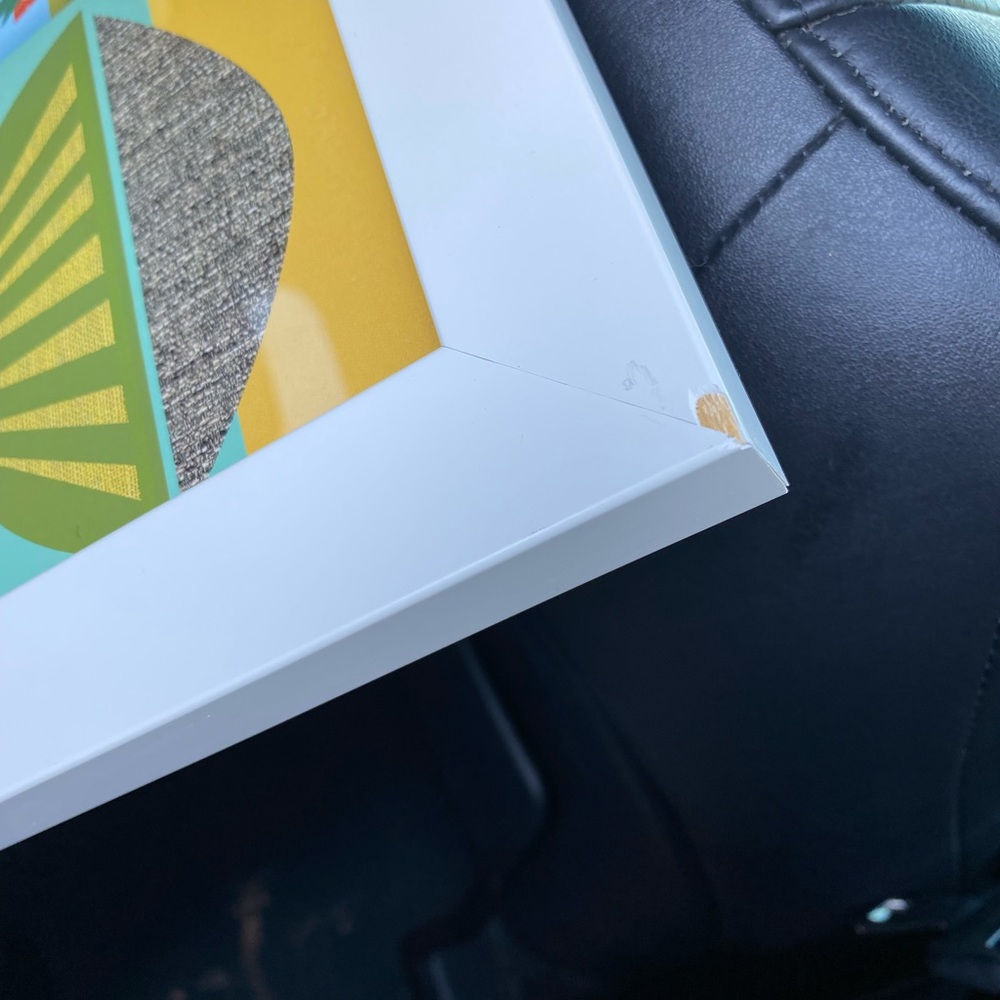 Framed poster damage